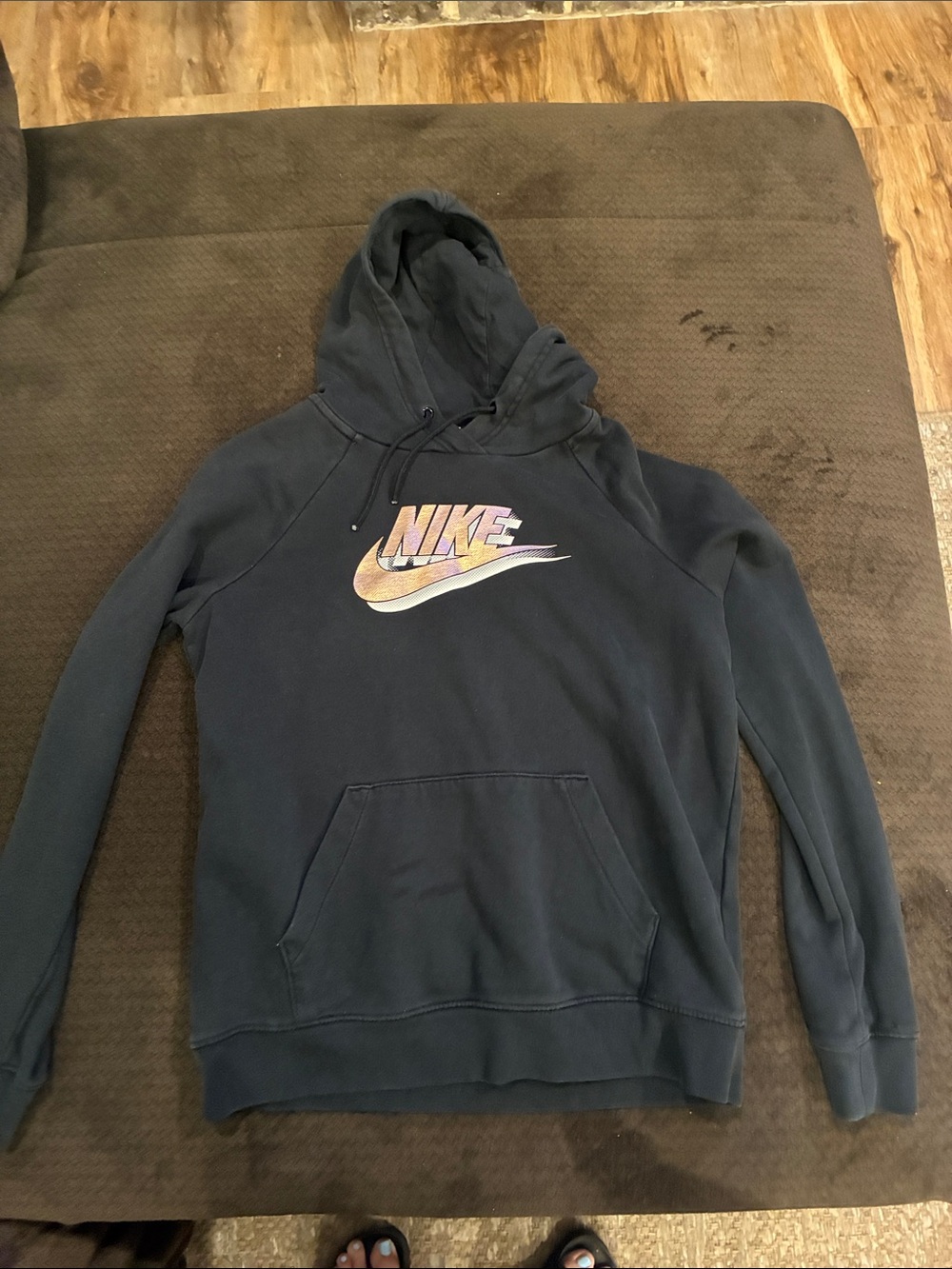 Women’s black hoodie with shiny rose gold Nike logo. Excellent condition